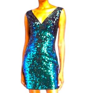 SHO by Tadashi. Green emerald sequence size XS will fit to a small. Stretch.